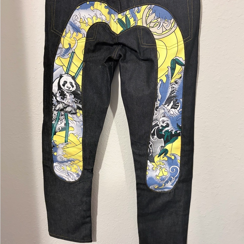 Evisu Black Jeans with Vibrant Artistic Design